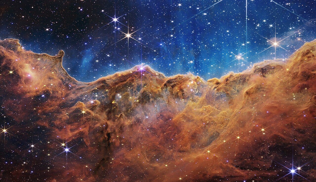 The Cosmic Cliffs in the Carina Nebula